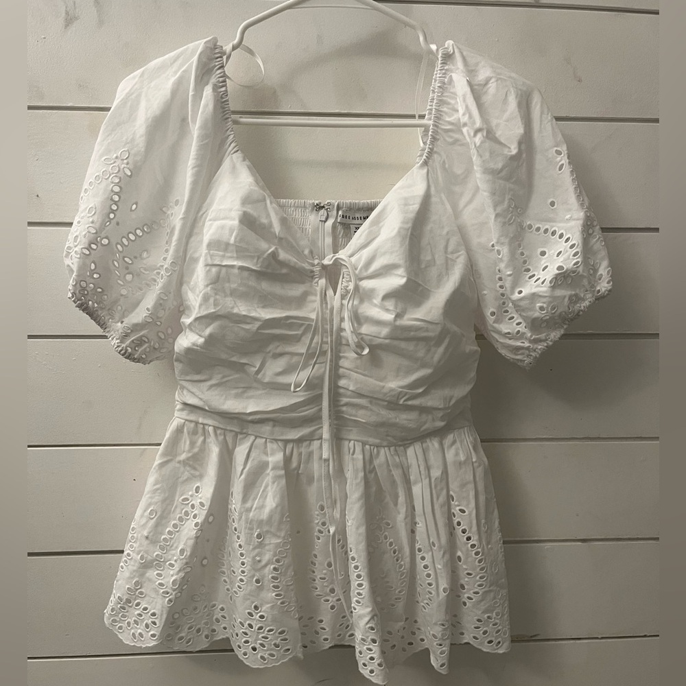 white shirt, brand new, and never been worn